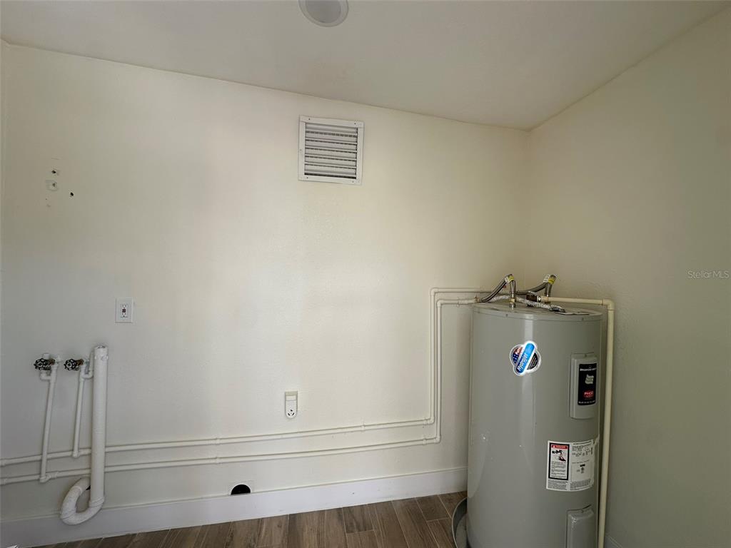 6013 Fortune Place, Unit 6013 Apollo Beach, FL 33572 - Photo 35 of 38 a view of washer and dryer