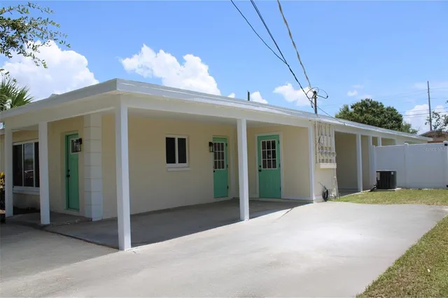 a front view of a house with a garage