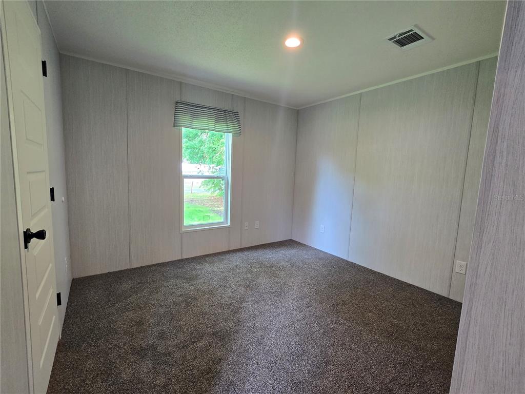 24048 Ermine Road Astor, FL 32102 - Photo 17 of 20 a view of empty room