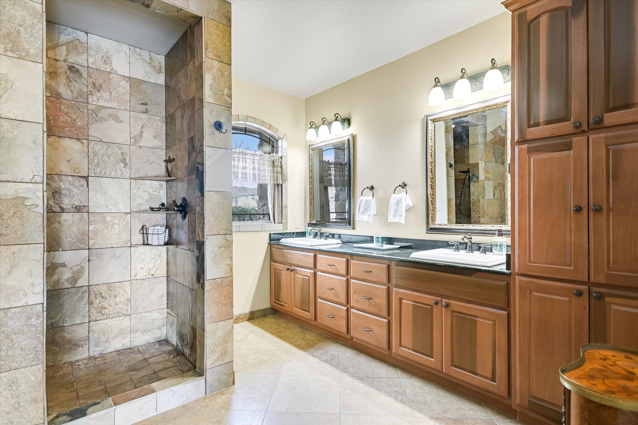 117 View Drive Georgetown, TX 78628 - Photo 19 of 40 Full bath with double vanity, a walk in shower, and light tile patterned floors