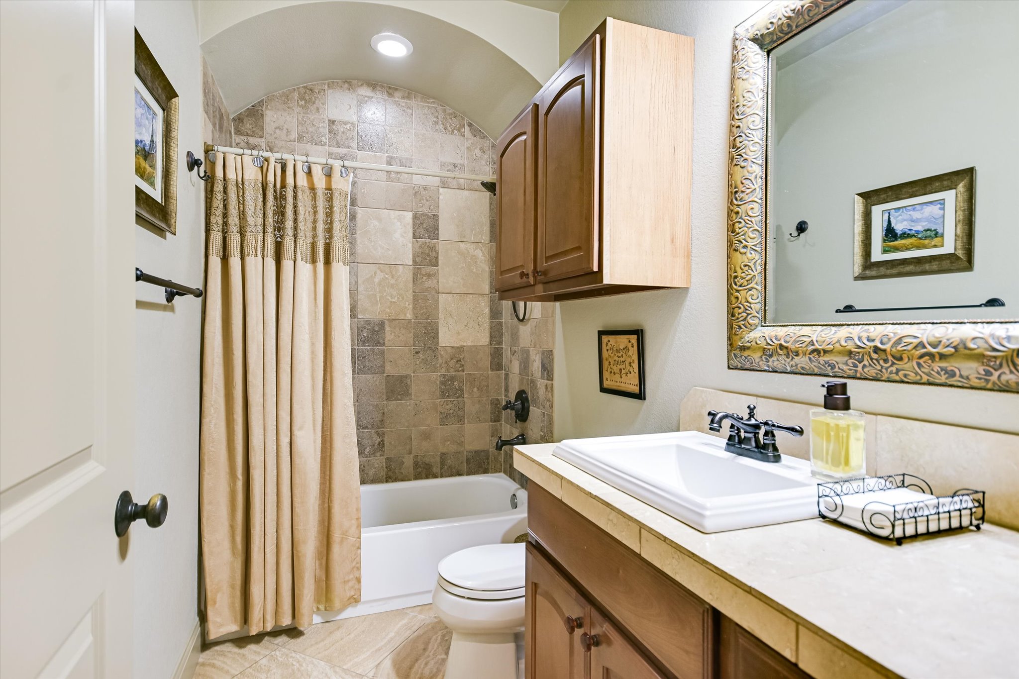 117 View Drive Georgetown, TX 78628 - Photo 23 of 40 Bathroom featuring vanity and shower / bathtub combination with curtain.