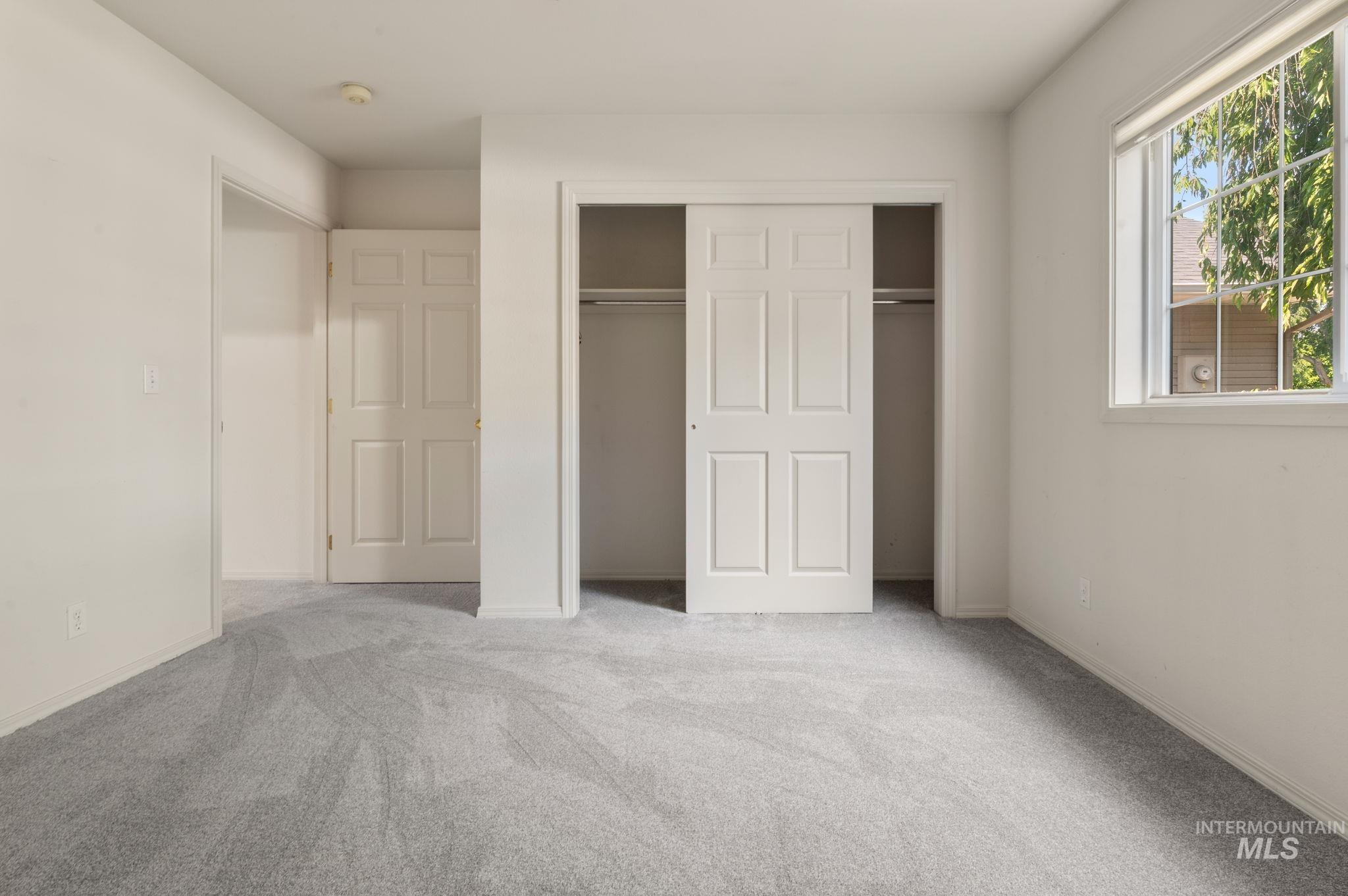 824 15th Avenue Lewiston, ID 83501 - Photo 15 of 37 Unfurnished bedroom with carpet floors and a closet