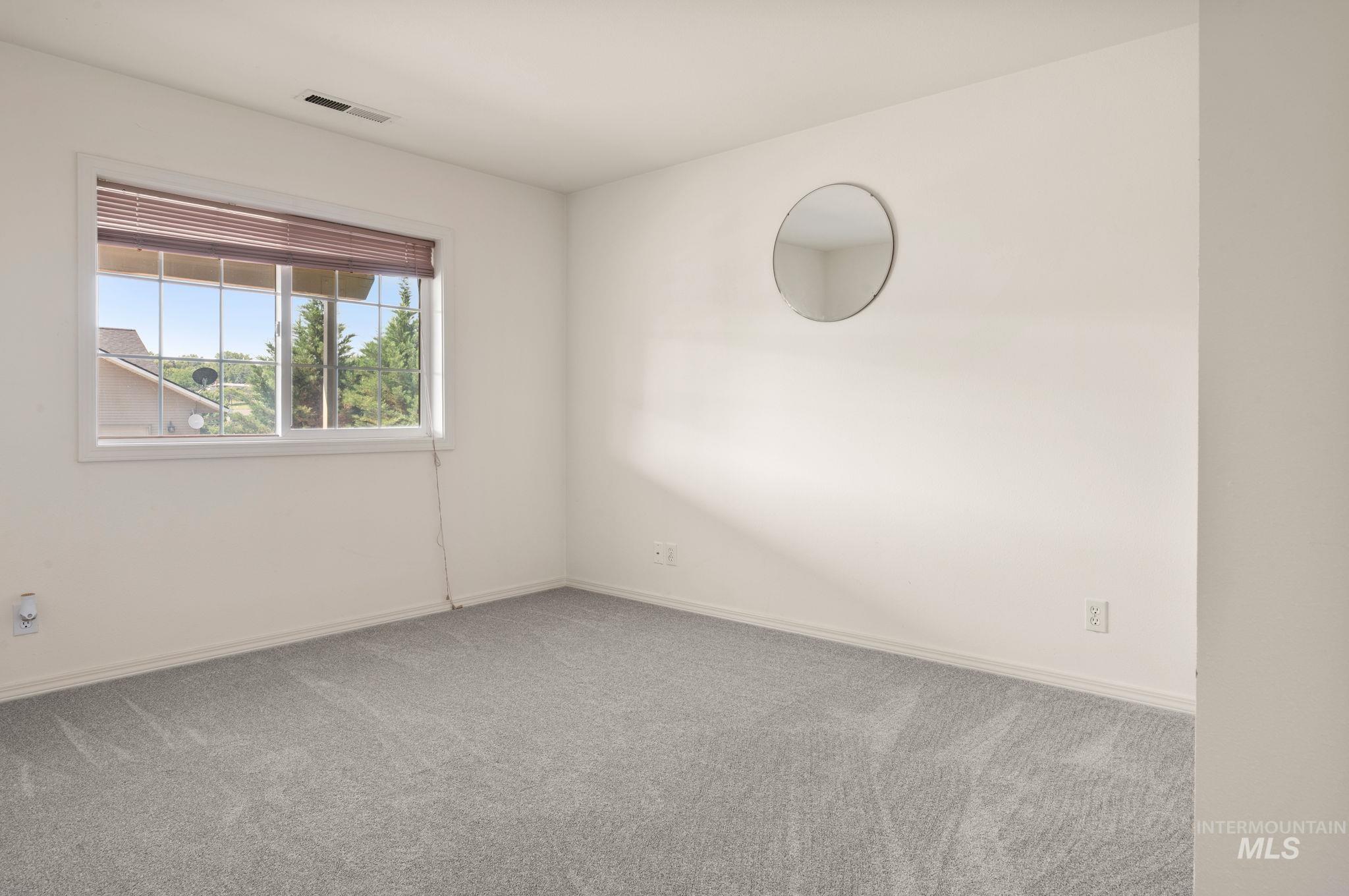 824 15th Avenue Lewiston, ID 83501 - Photo 23 of 37 Empty room with carpet flooring and baseboards