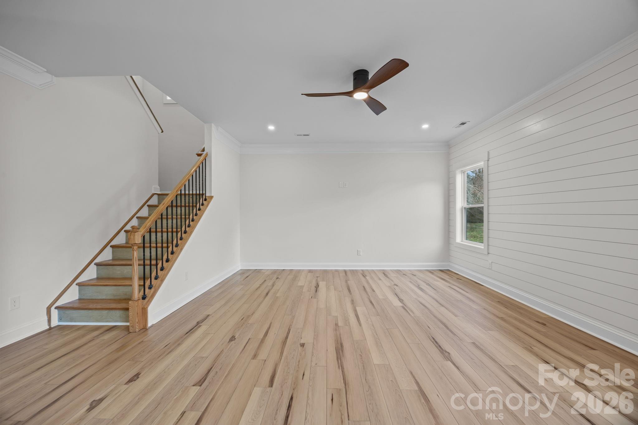 1050 Gibson Road Salisbury, NC 28147 - Photo 15 of 47 wooden floor in an empty room with a window
