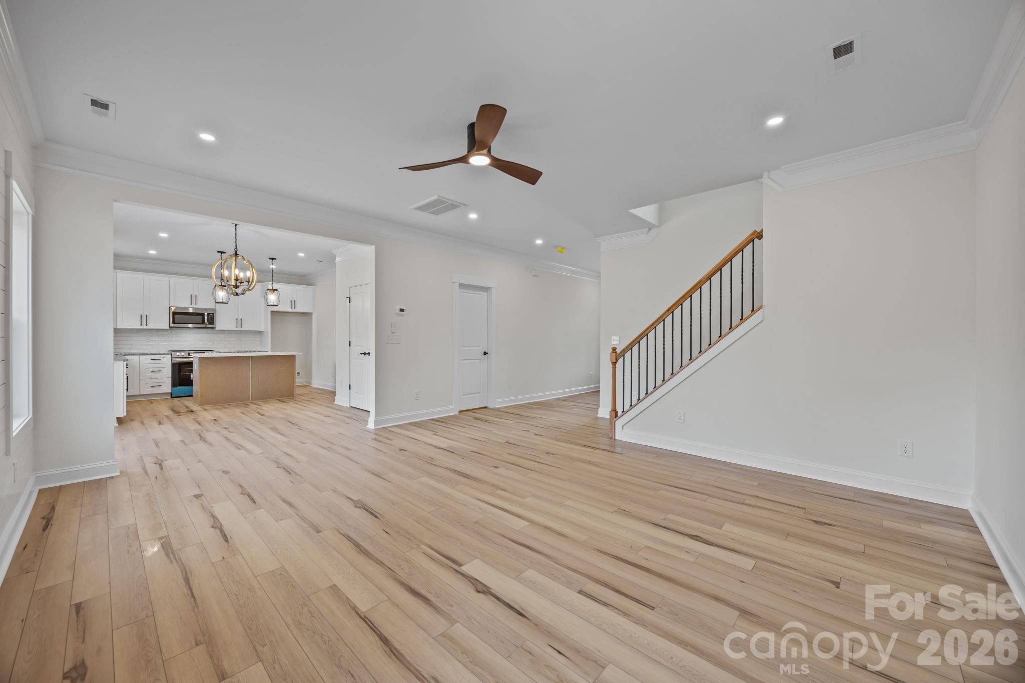 1050 Gibson Road Salisbury, NC 28147 - Photo 17 of 47 a view of a kitchen with wooden floor and a sink