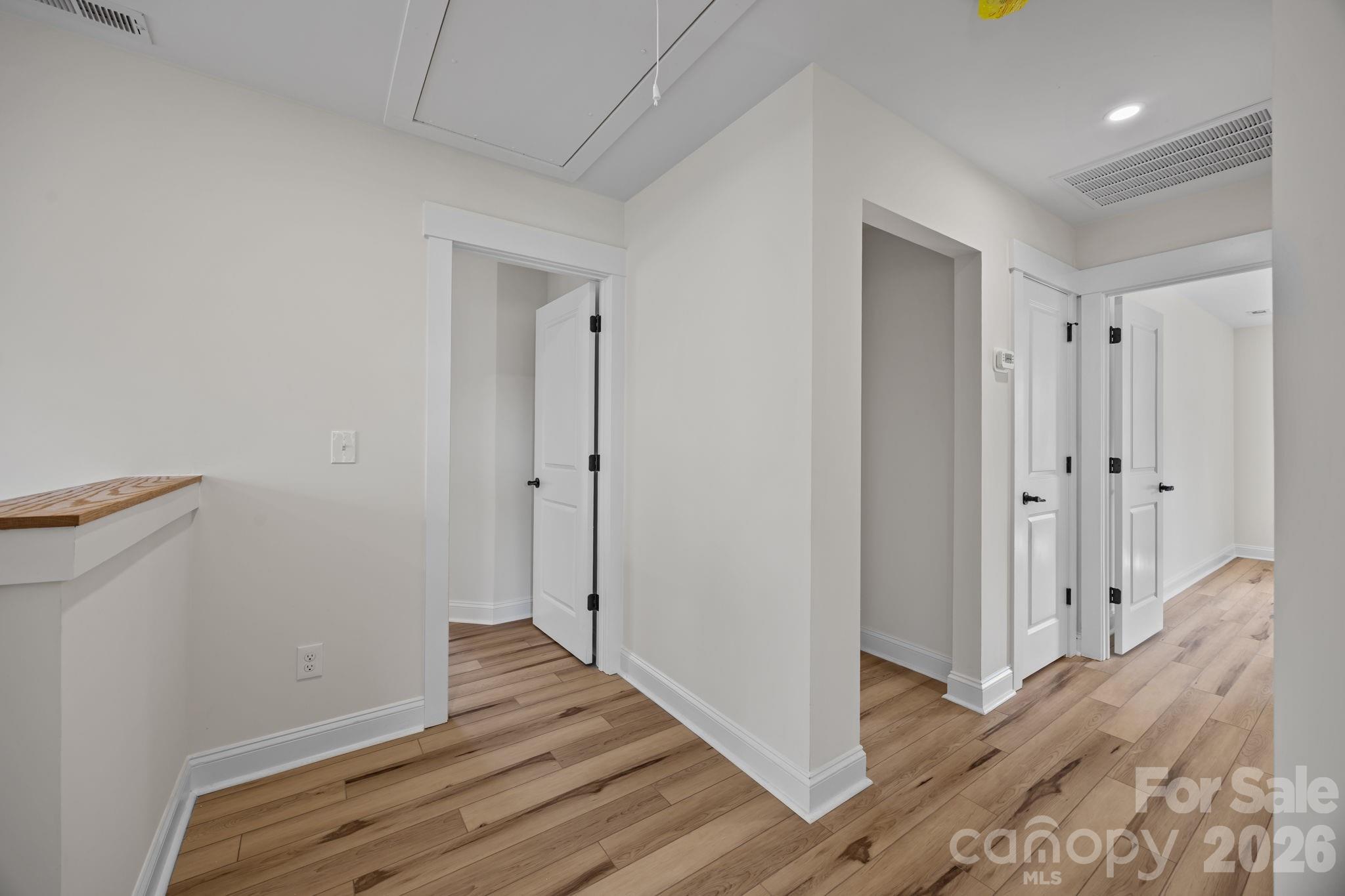 1050 Gibson Road Salisbury, NC 28147 - Photo 27 of 47 a view of a hallway with wooden floor and closet