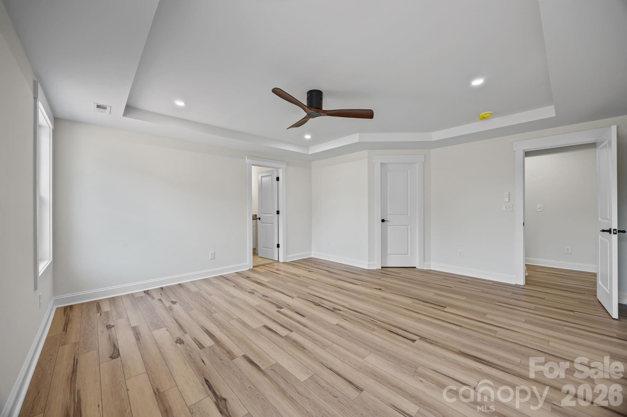 1050 Gibson Road Salisbury, NC 28147 - Photo 29 of 47 a view of empty room with wooden floor and fan