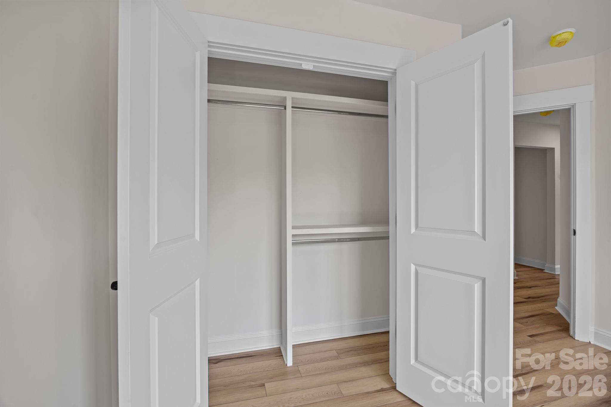 1050 Gibson Road Salisbury, NC 28147 - Photo 34 of 47 a room with wooden floor and closet