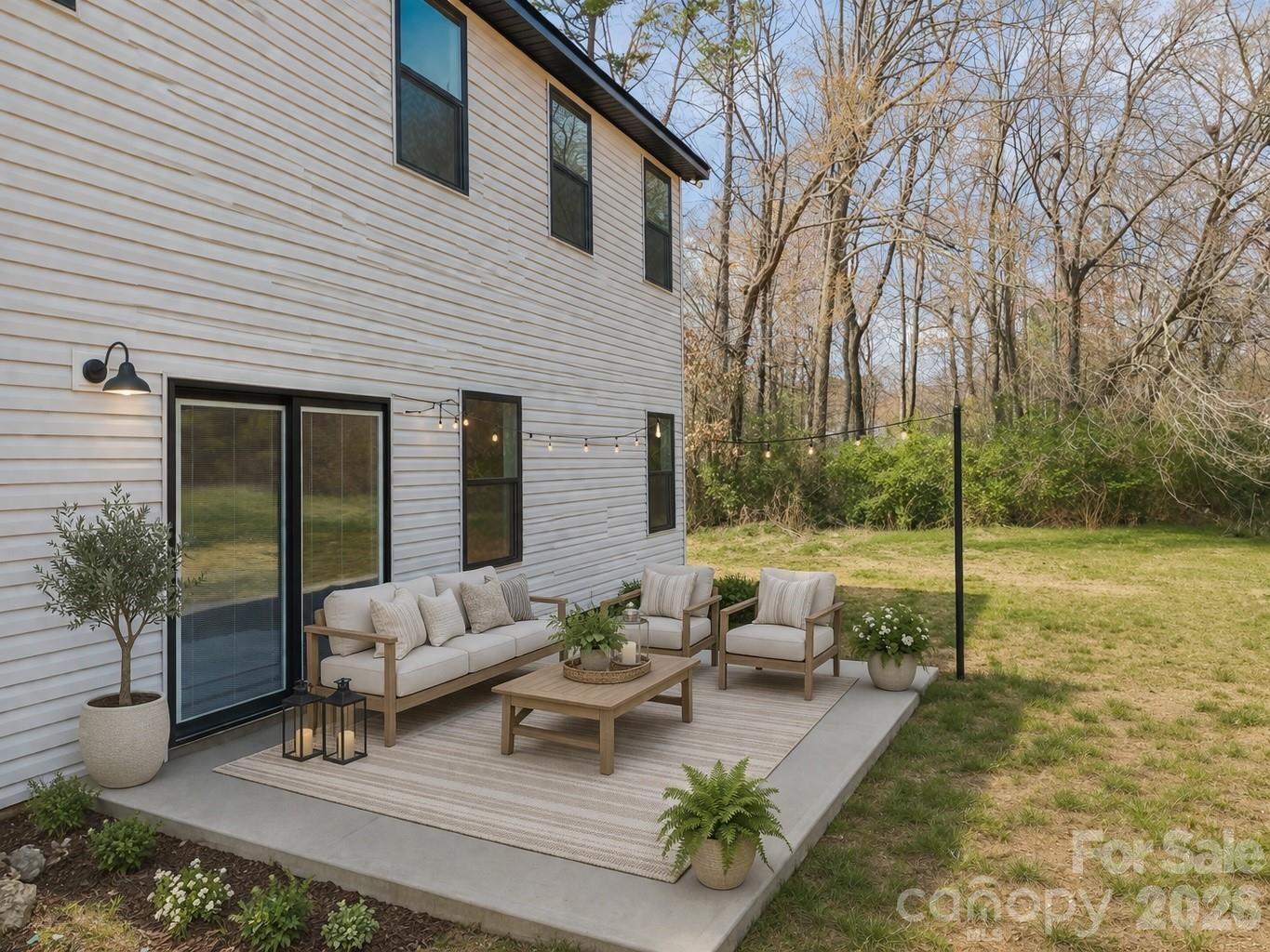 1050 Gibson Road Salisbury, NC 28147 - Photo 8 of 47 a view of a house with backyard and sitting area