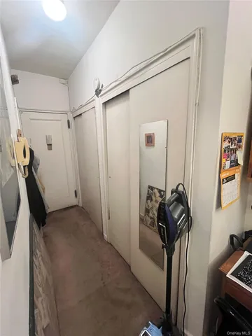 a view of a hallway with workspace