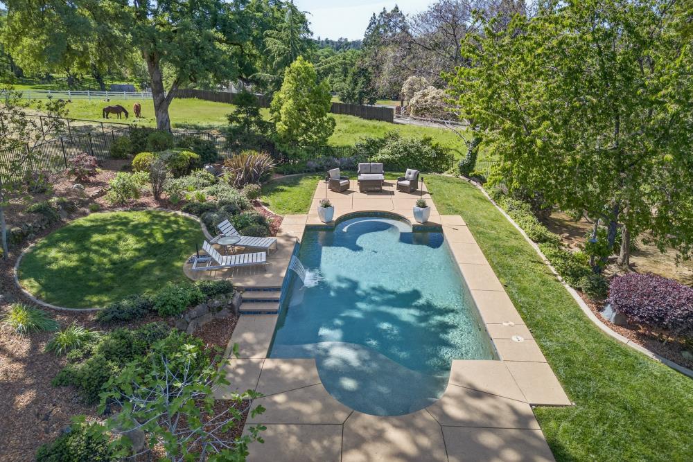 5560 Ralston Way Placerville, CA 95667 - Photo 39 of 78 Drone Photo of Pool Area with one of the pastures in the Background