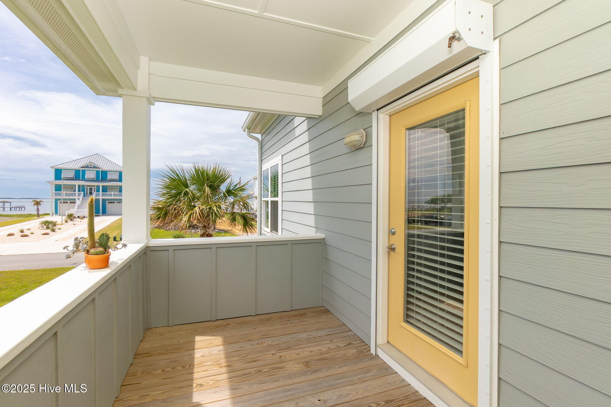 139 Sound Point Drive Harkers Island, NC 28531 - Photo 24 of 70 Deck off Principle Bedroom