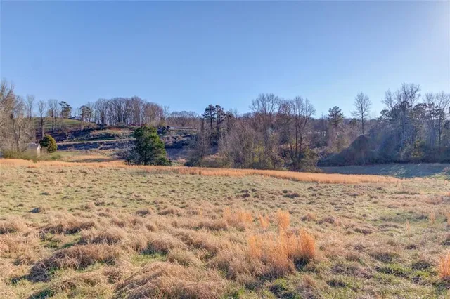 a kitchen with a table and chairs in it