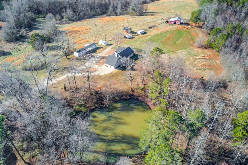 4404 Tanners Mill Road Braselton, GA 30517 - Photo 20 of 76 a view of swimming pool with a yard