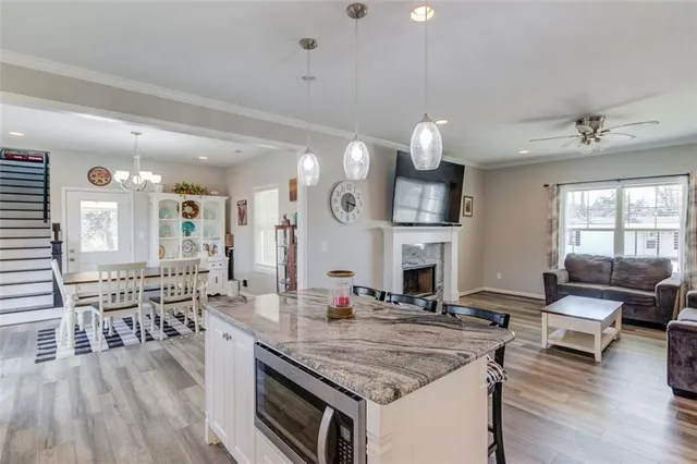 swimming pool view with a sitting space