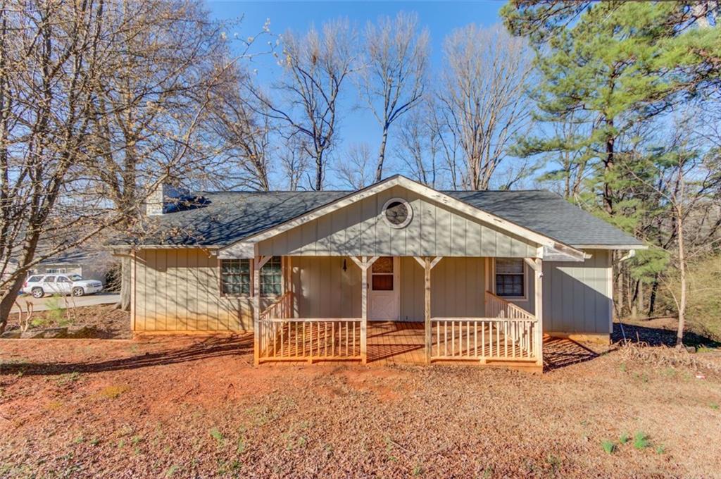 4404 Tanners Mill Road Braselton, GA 30517 - Photo 52 of 76 front view of a house with a yard