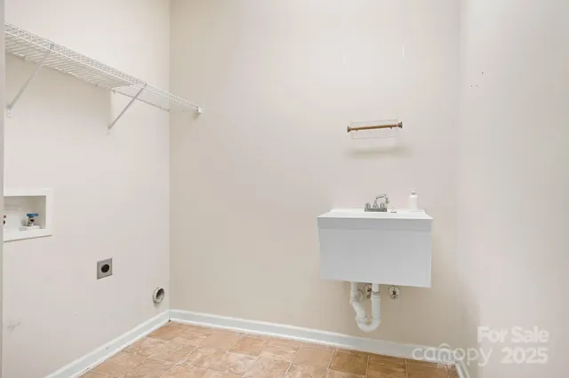 a bathroom with a sink and mirror