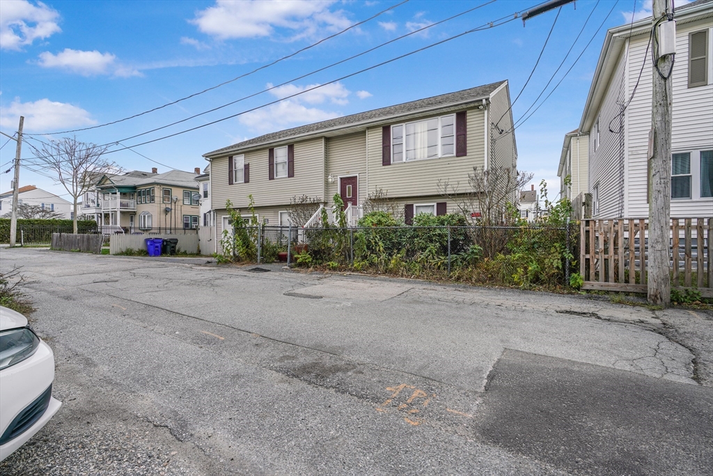a city view with tall buildings and a street view