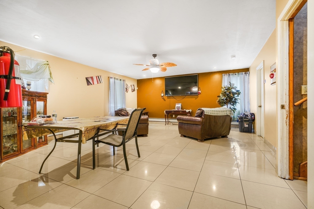 76 Price Place Fall River, MA 02724 - Photo 14 of 27 a living room with furniture and a flat screen tv