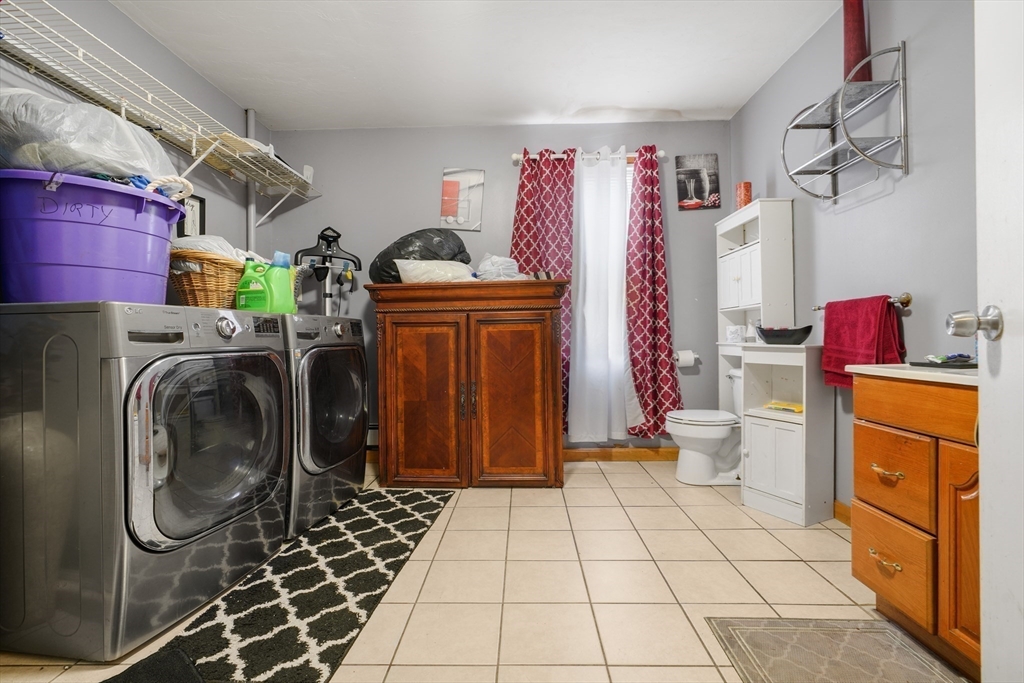 76 Price Place Fall River, MA 02724 - Photo 25 of 27 a utility room with dryer and washer