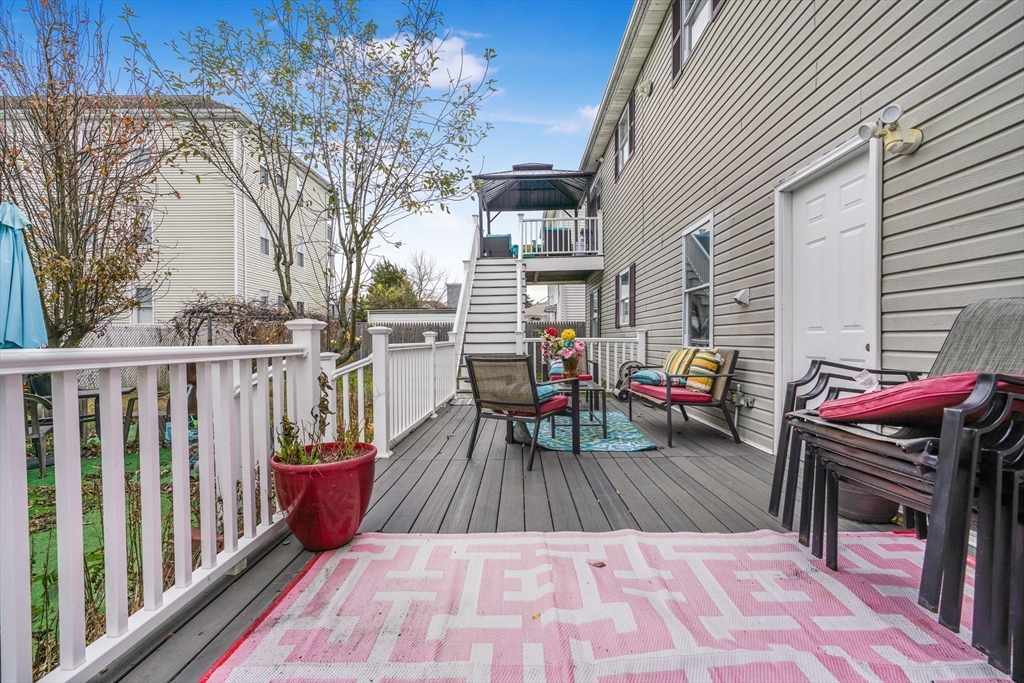 76 Price Place Fall River, MA 02724 - Photo 26 of 27 a view of a patio with wooden floor