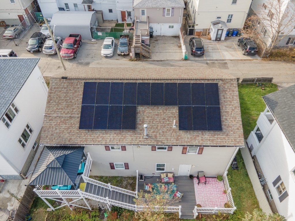 76 Price Place Fall River, MA 02724 - Photo 27 of 27 a kitchen with granite countertop lots of clutter and stainless steel appliances