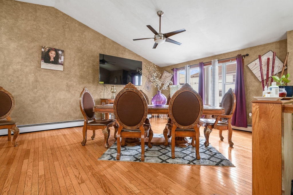 76 Price Place Fall River, MA 02724 - Photo 5 of 27 a view of a livingroom with furniture a window and wooden floor