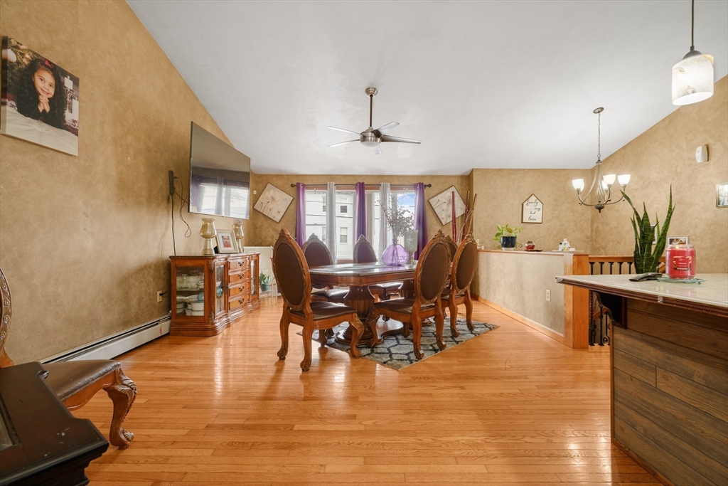 76 Price Place Fall River, MA 02724 - Photo 6 of 27 a view of a dining room with furniture window and wooden floor