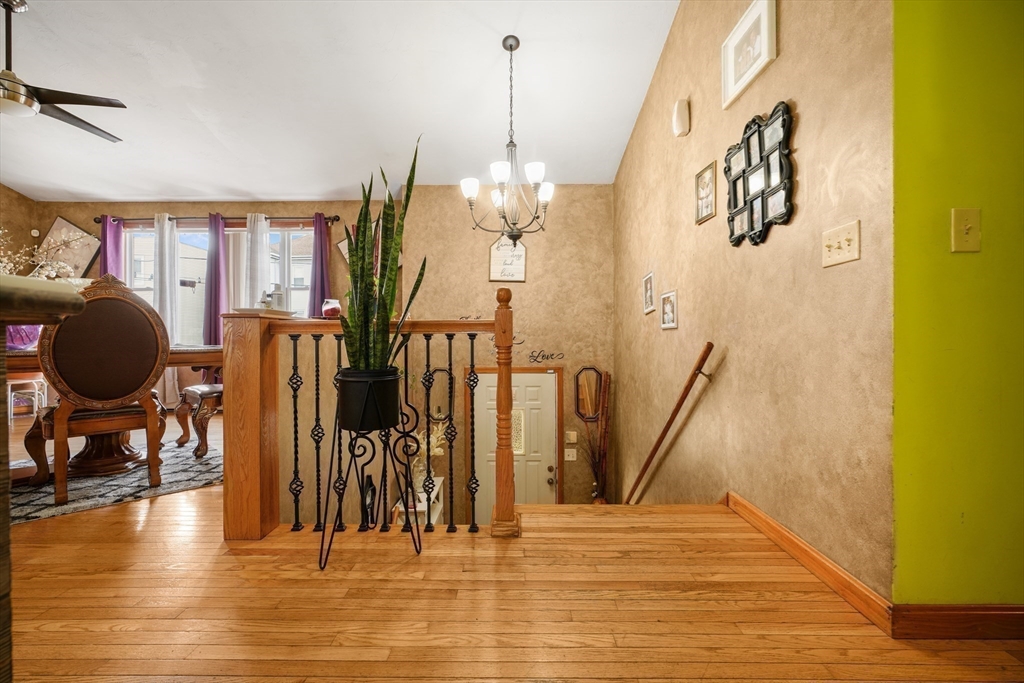 76 Price Place Fall River, MA 02724 - Photo 7 of 27 a view of a livingroom with furniture and a floor to ceiling window