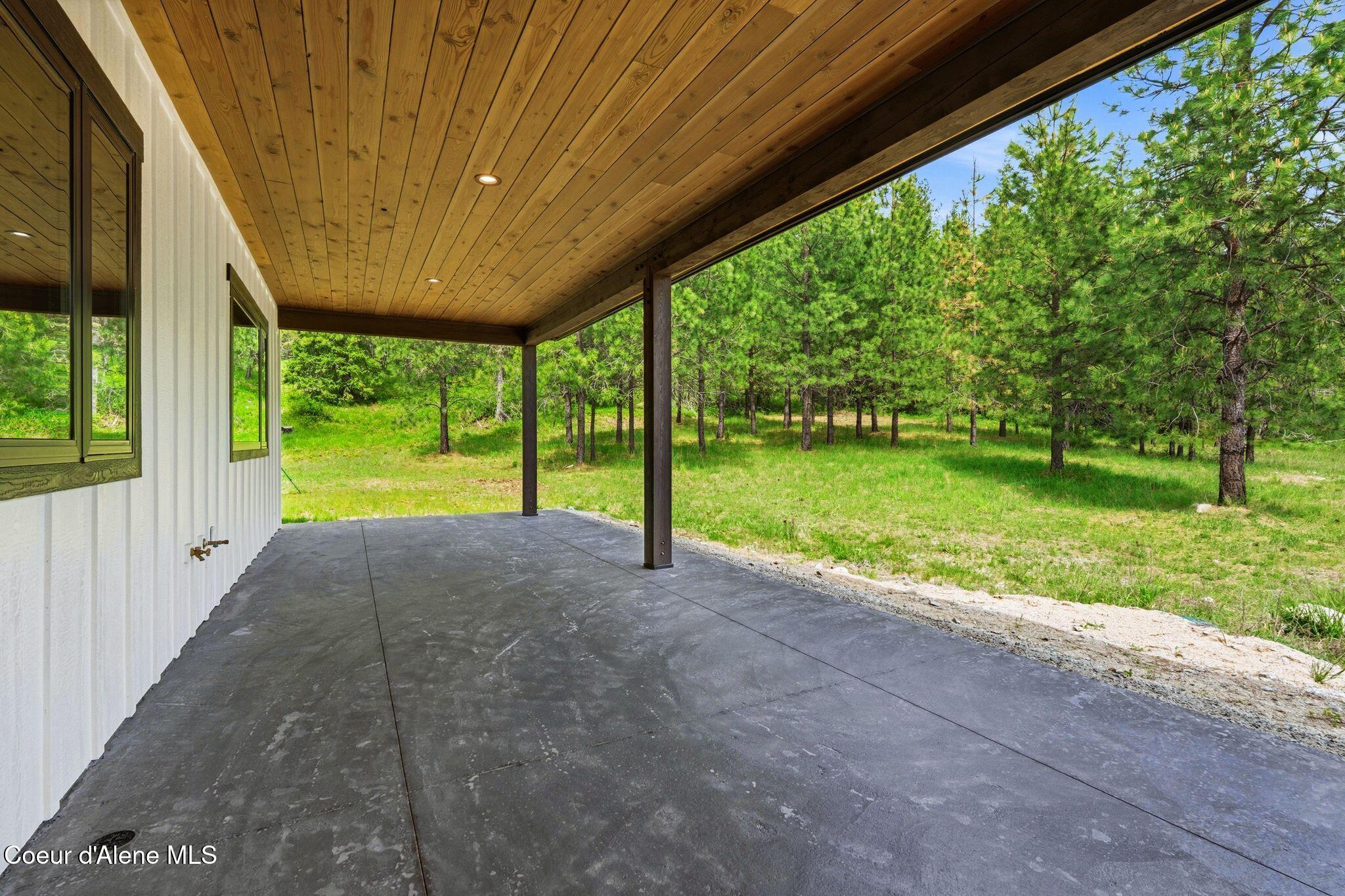 1520 Wrenco Loop Sandpoint, ID 83864 - Photo 30 of 37 Porch - Kitchen Side 2