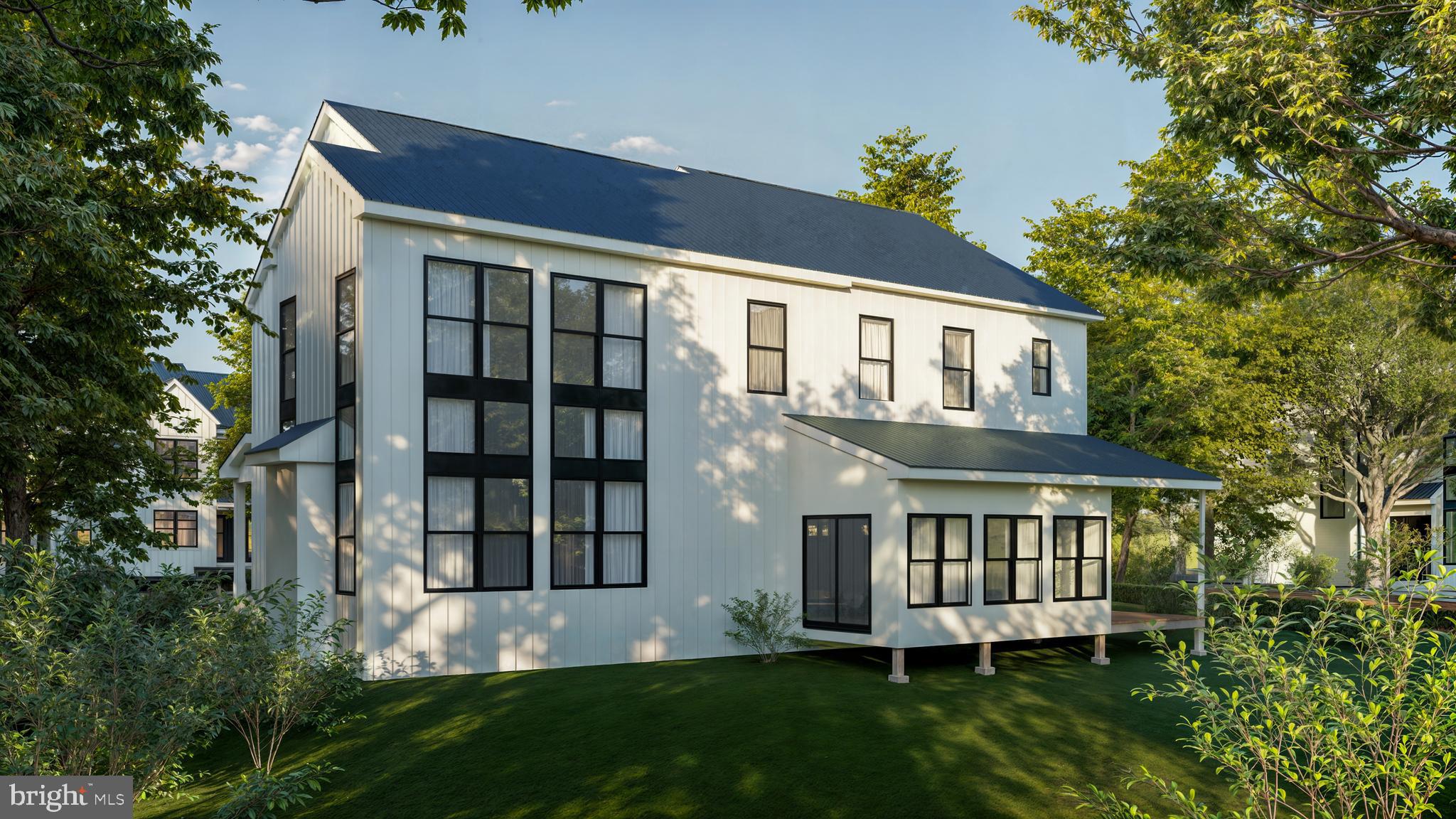 4 Arden Road Conshohocken, PA 19428 - Photo 7 of 13 a front view of a house with a yard and porch
