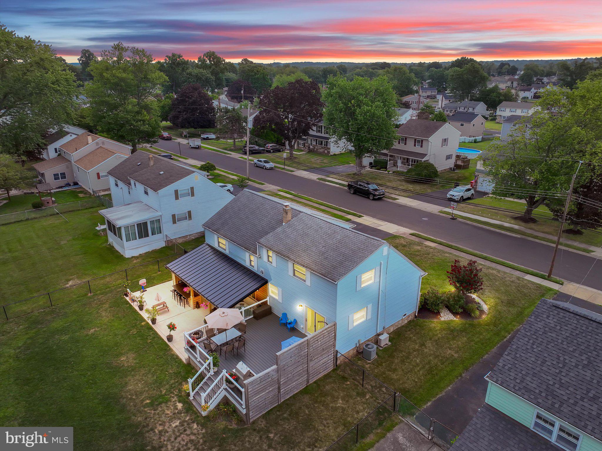 1019 Howard Road Warminster, PA 18974 - Photo 65 of 69 Charming home under a vibrant sunset.