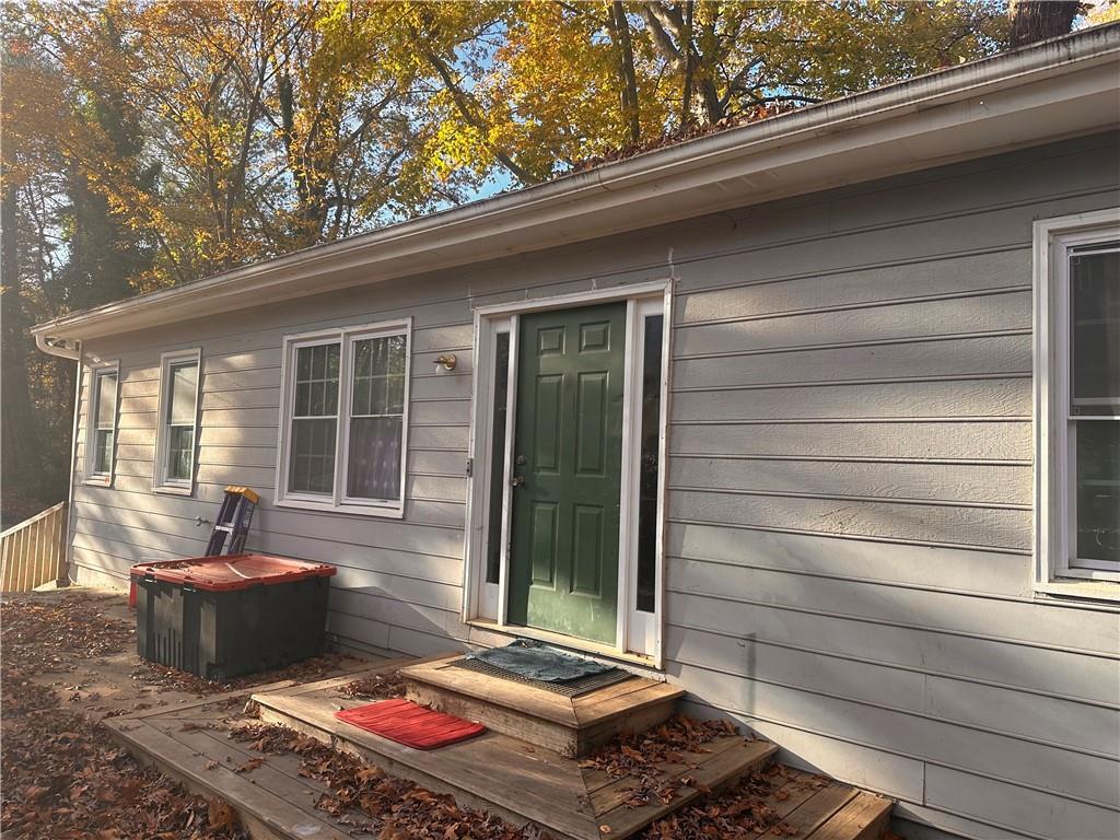 1637 Roman Point Drive Norcross, GA 30093 - Photo 1 of 21 a backyard of a house with outdoor seating