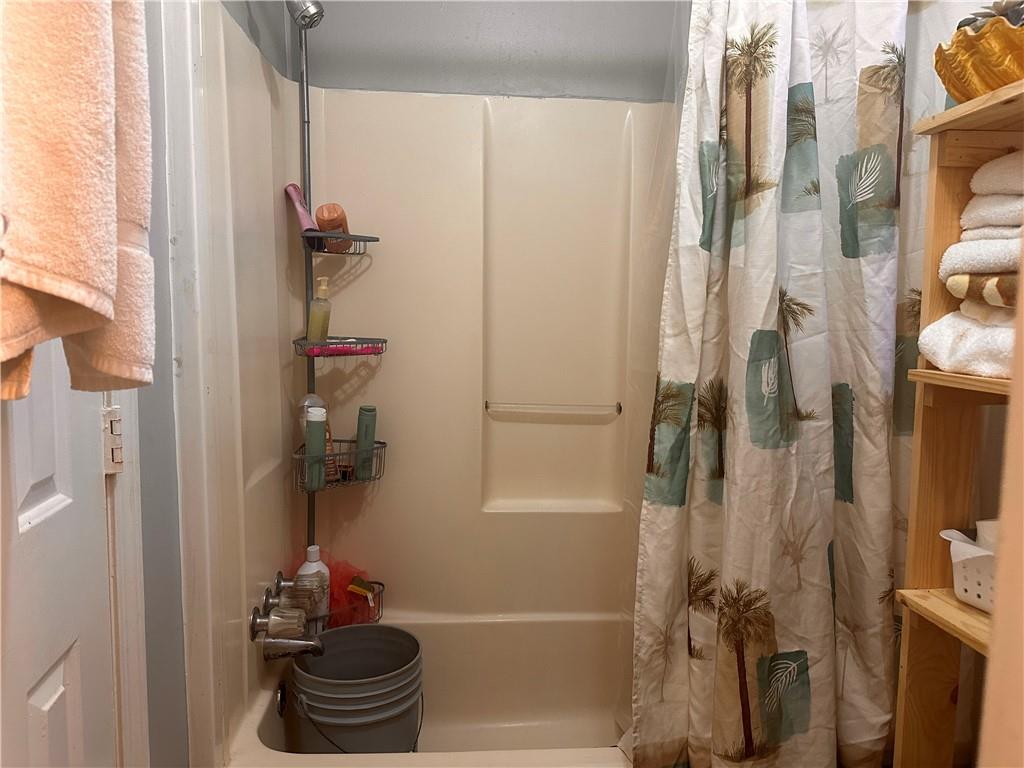 1637 Roman Point Drive Norcross, GA 30093 - Photo 14 of 21 a bathroom with a shower