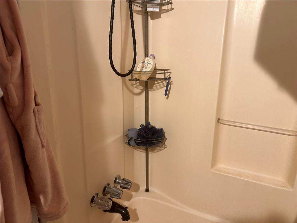 1637 Roman Point Drive Norcross, GA 30093 - Photo 17 of 21 a bathroom with a shower