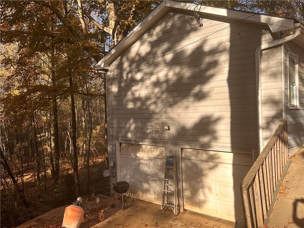 1637 Roman Point Drive Norcross, GA 30093 - Photo 3 of 21 a backyard of a house with outdoor seating