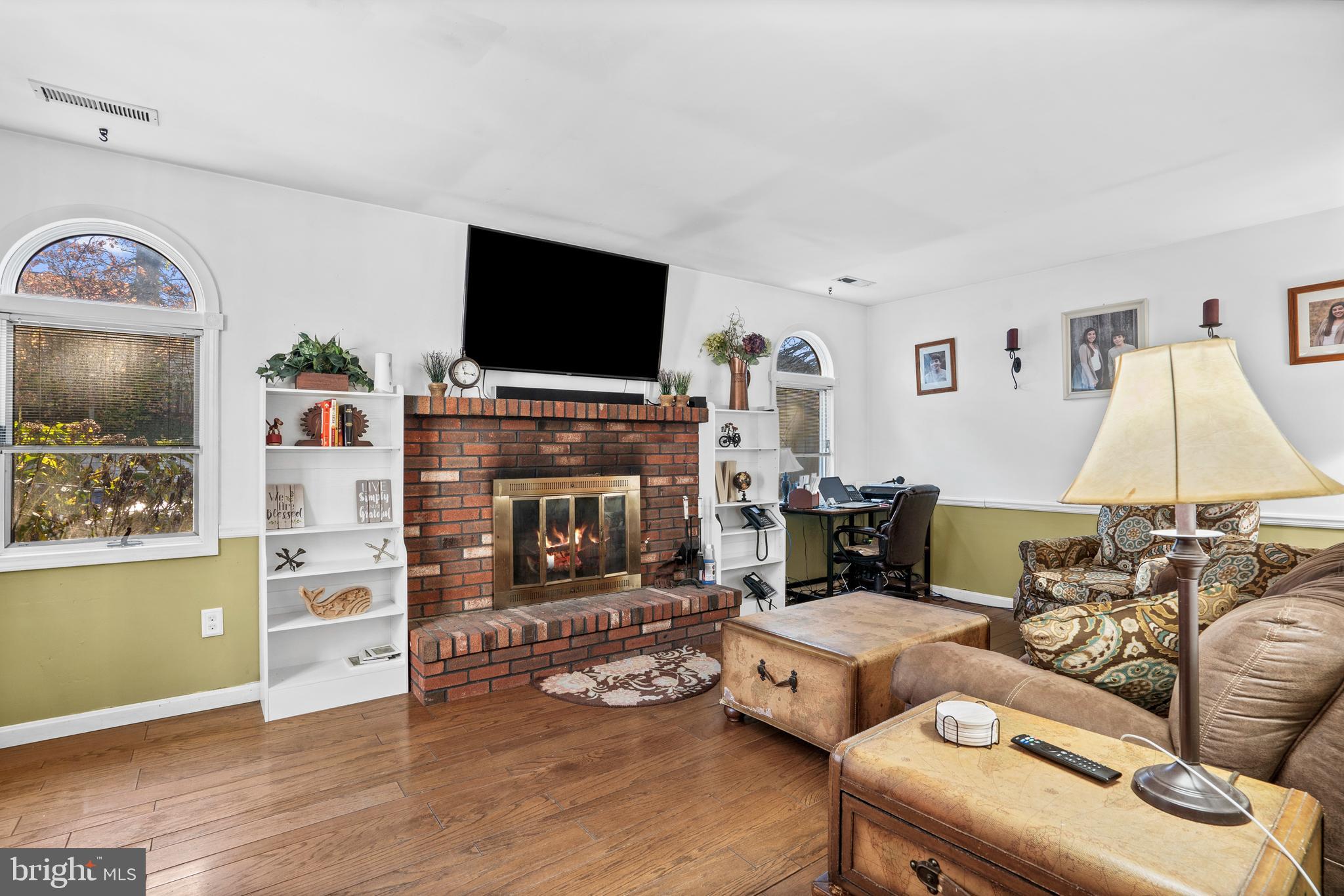 18 Essex Lane Langhorne, PA 19047 - Photo 19 of 50 a living room with furniture and a flat screen tv