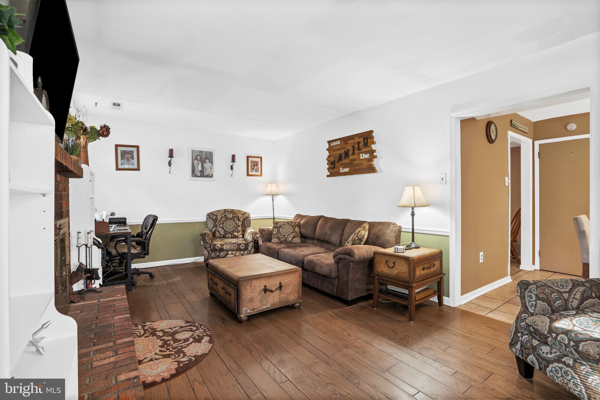 18 Essex Lane Langhorne, PA 19047 - Photo 20 of 50 a living room with furniture and a couch