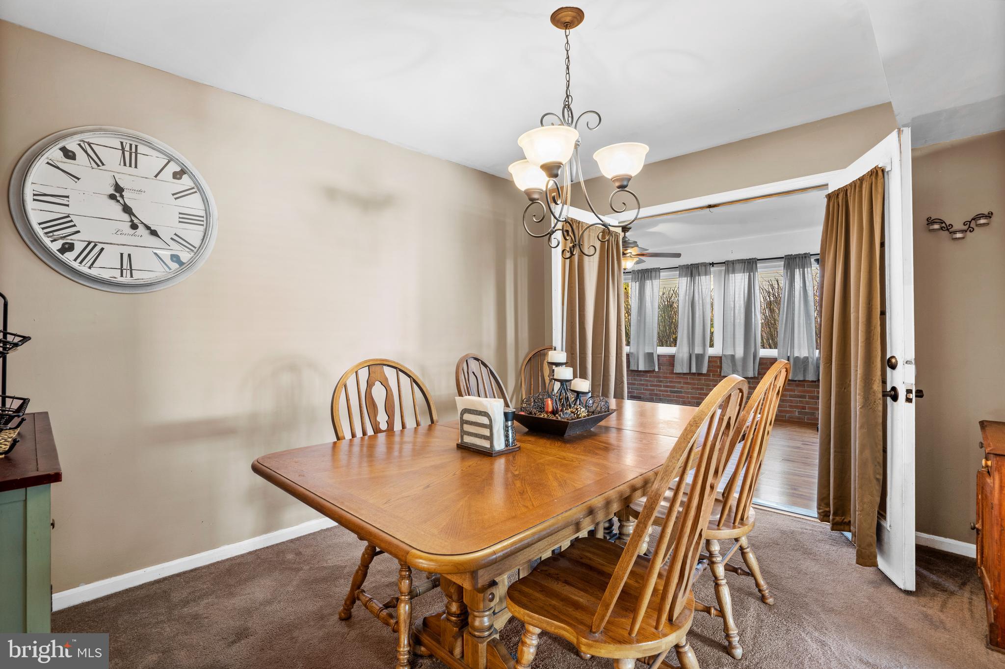 18 Essex Lane Langhorne, PA 19047 - Photo 23 of 50 a view of a dining room with furniture window and wooden floor