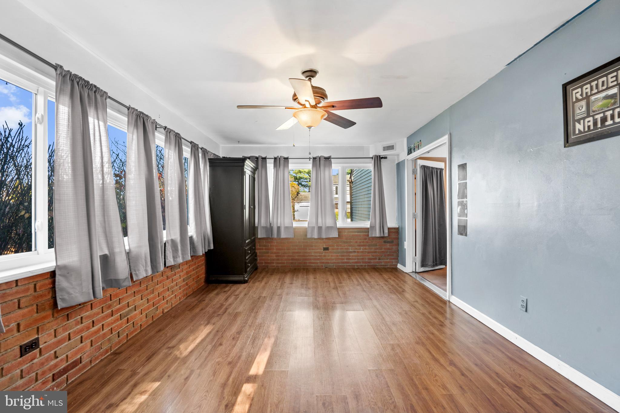 18 Essex Lane Langhorne, PA 19047 - Photo 26 of 50 a view of a room with a ceiling fan window and wooden floor