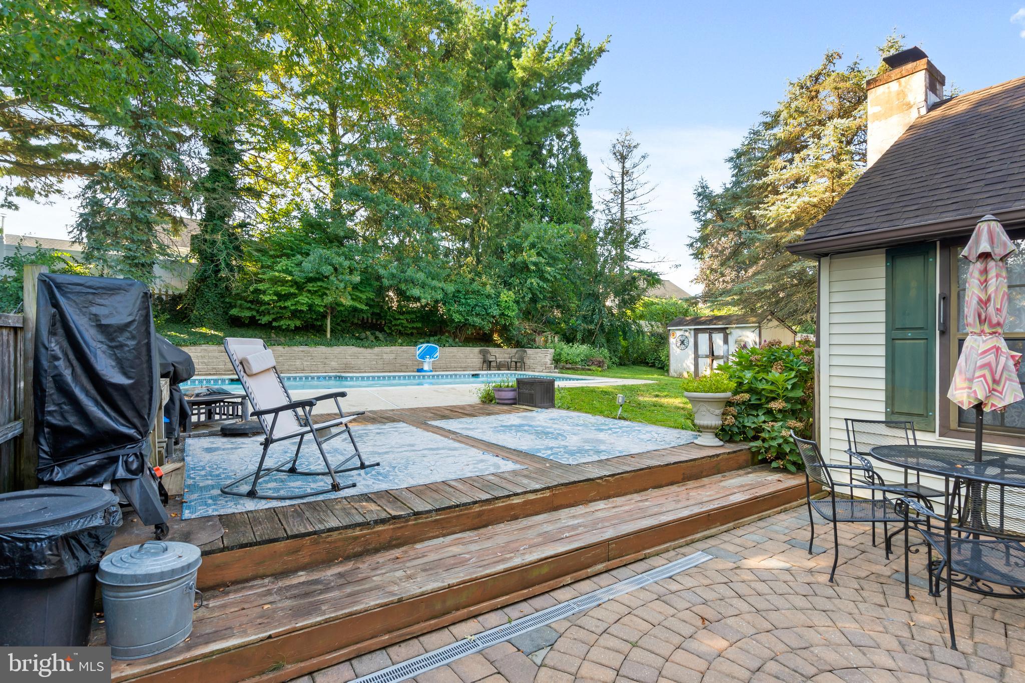 18 Essex Lane Langhorne, PA 19047 - Photo 41 of 50 a view of a patio with table and chairs and potted plants