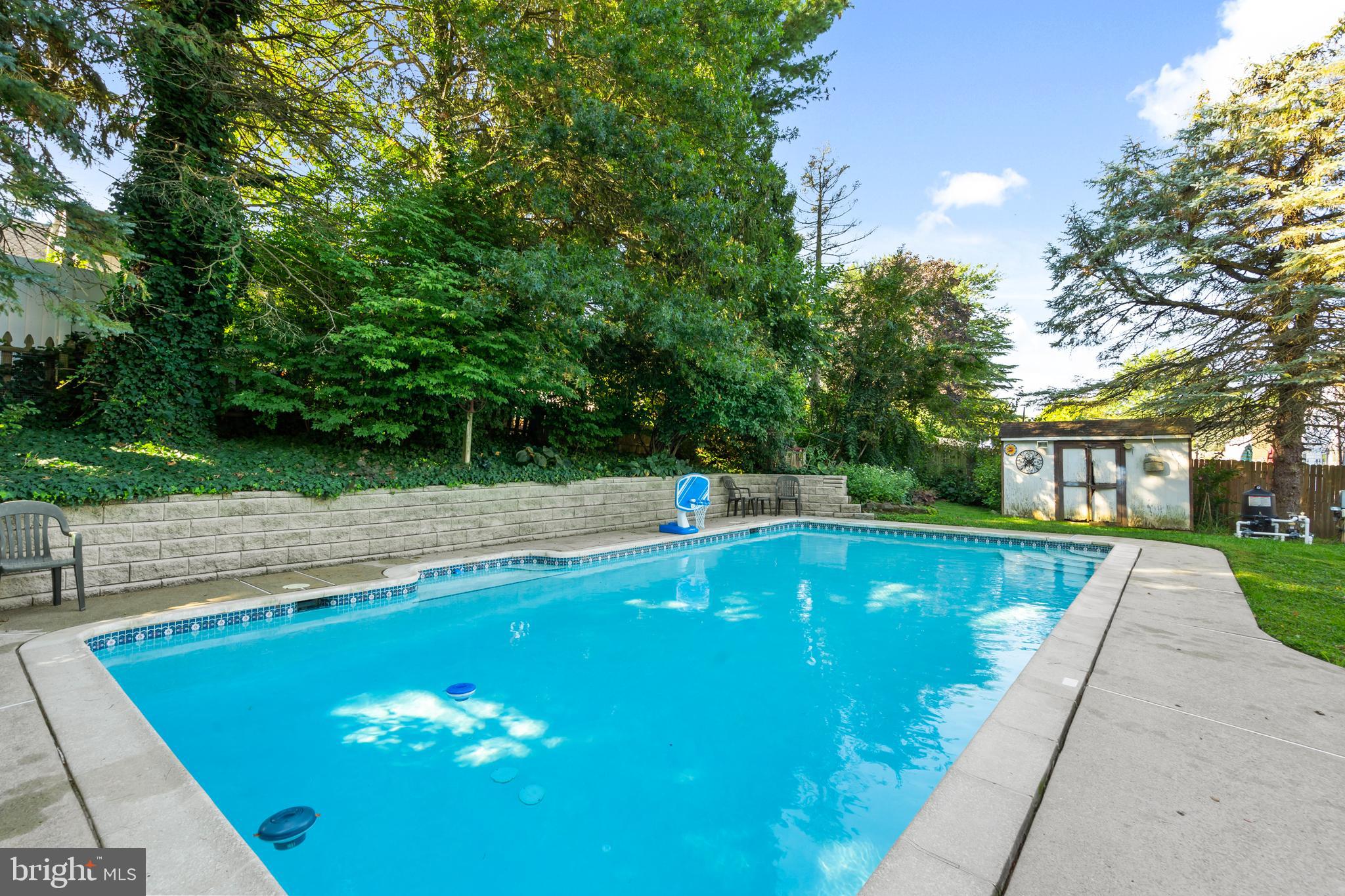 18 Essex Lane Langhorne, PA 19047 - Photo 43 of 50 a view of a swimming pool with a yard