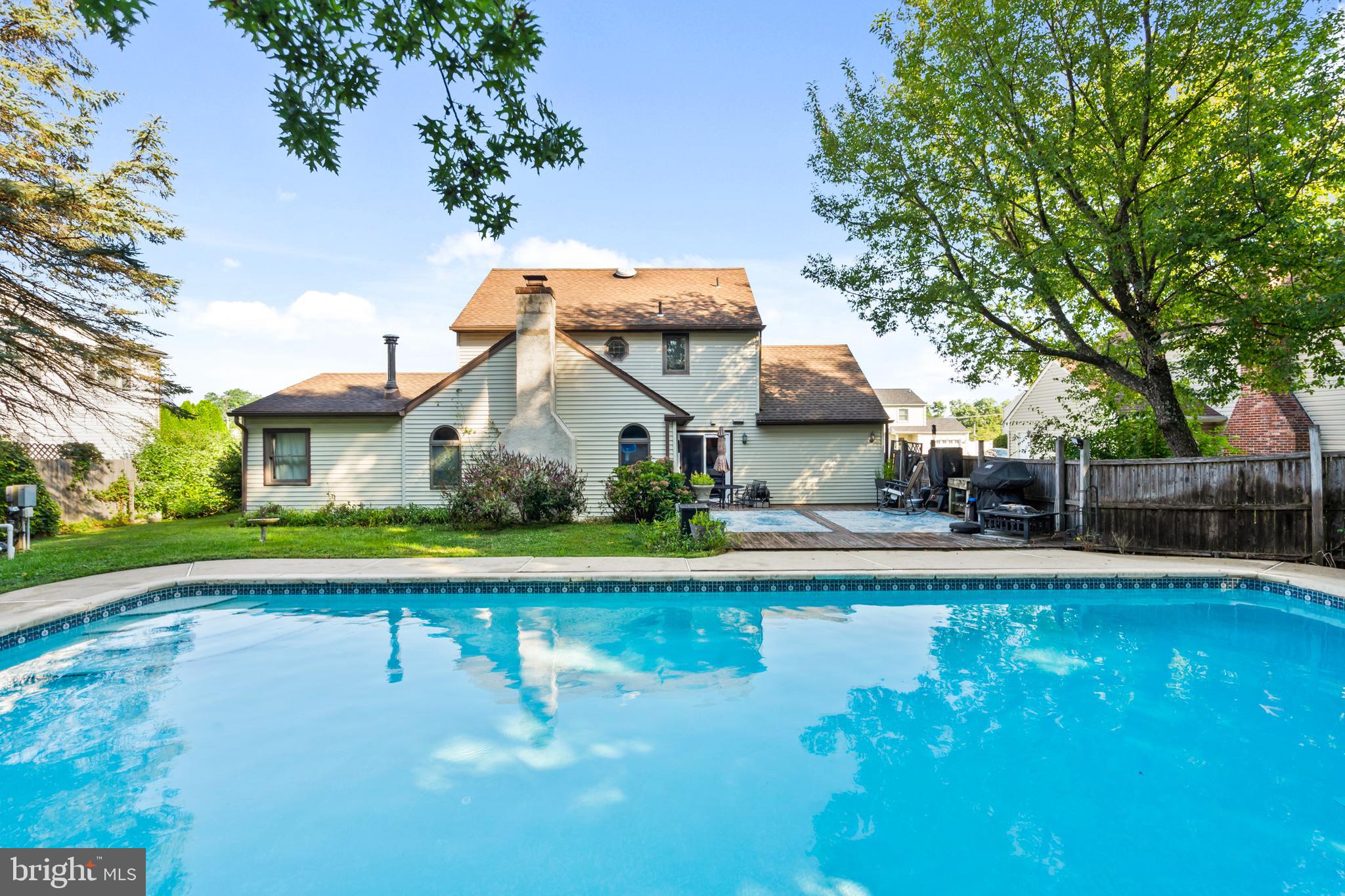 18 Essex Lane Langhorne, PA 19047 - Photo 46 of 50 a view of a house with pool and a yard