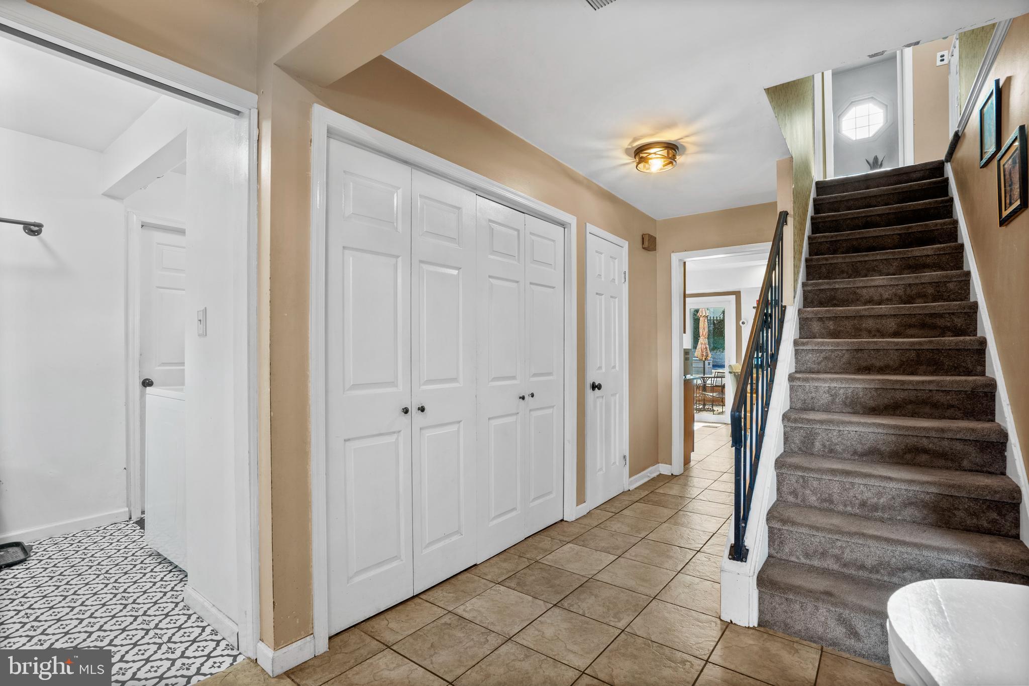 18 Essex Lane Langhorne, PA 19047 - Photo 10 of 50 a view of a hallway with entryway and stairs