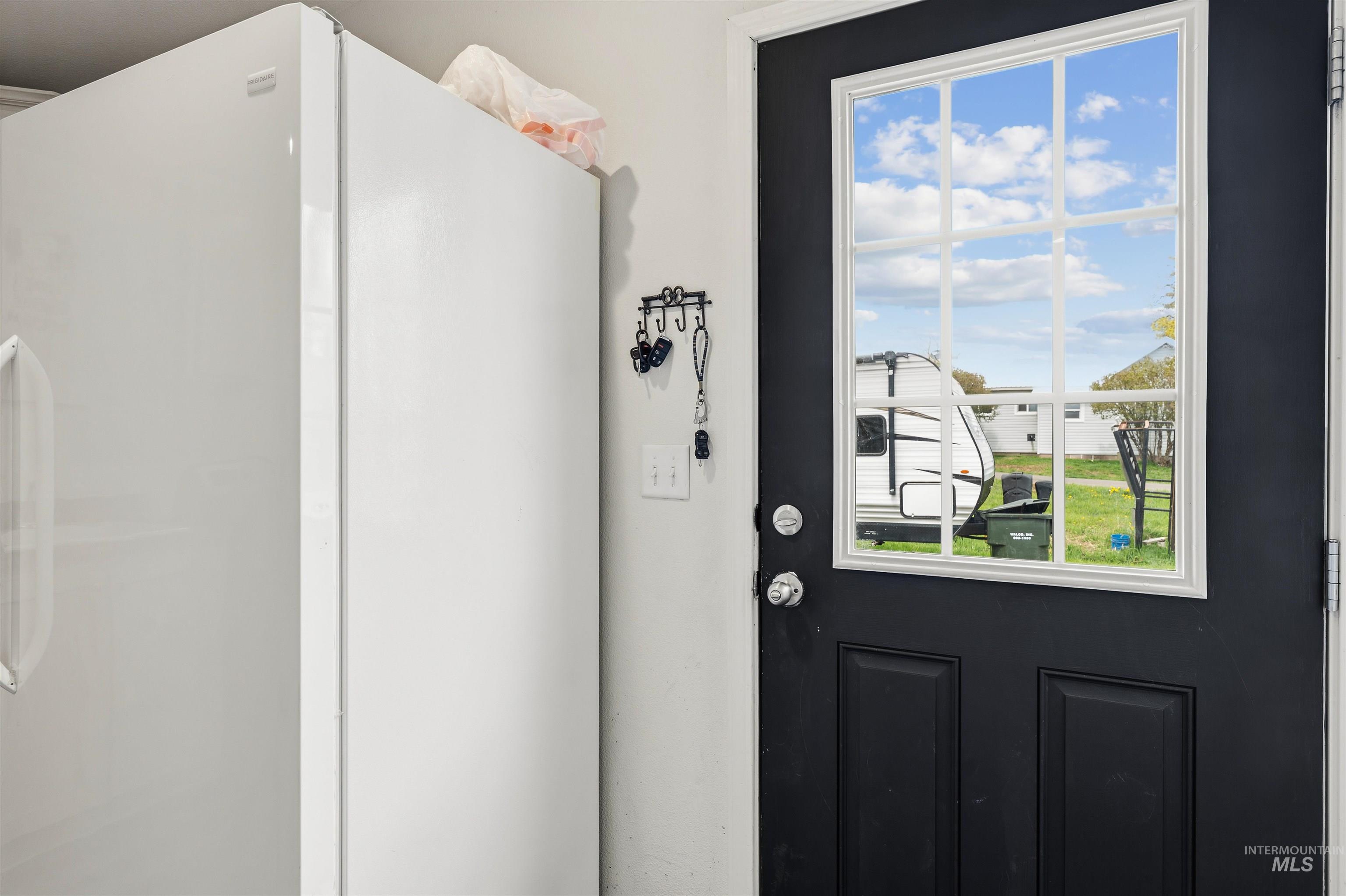 302 3rd Avenue Craigmont, ID 83523 - Photo 21 of 31 Black paneled door with a multi-pane window