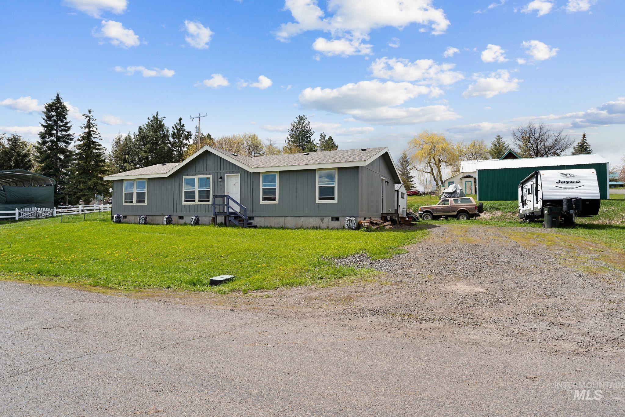 302 3rd Avenue Craigmont, ID 83523 - Photo 30 of 31 Single-story residence featuring gray siding and a light-colored roof