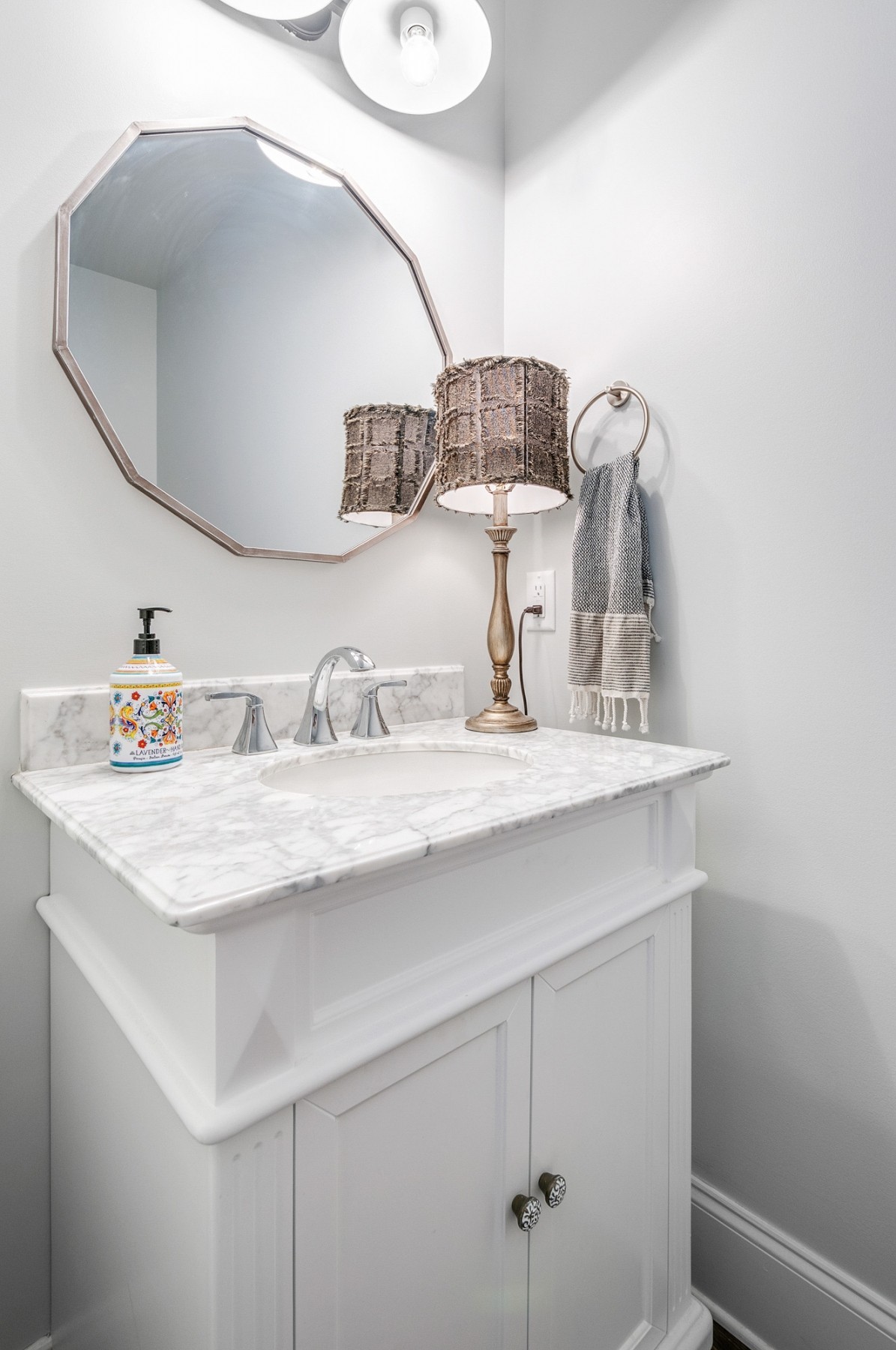 1043 Calico Street Franklin, TN 37064 - Photo 15 of 35 a bathroom with a sink and a mirror