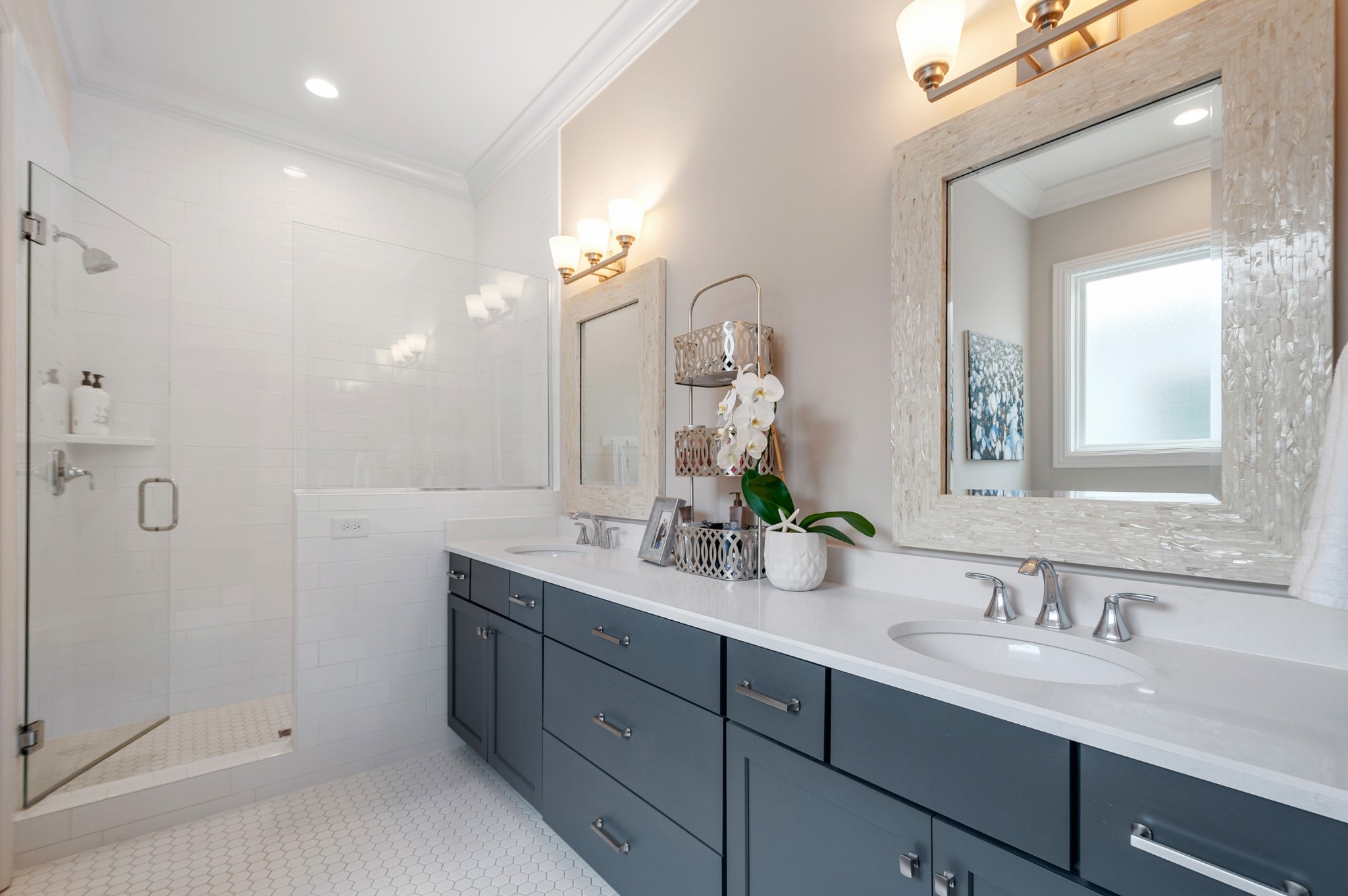 1043 Calico Street Franklin, TN 37064 - Photo 21 of 35 a bathroom with double vanity sinks and a mirror