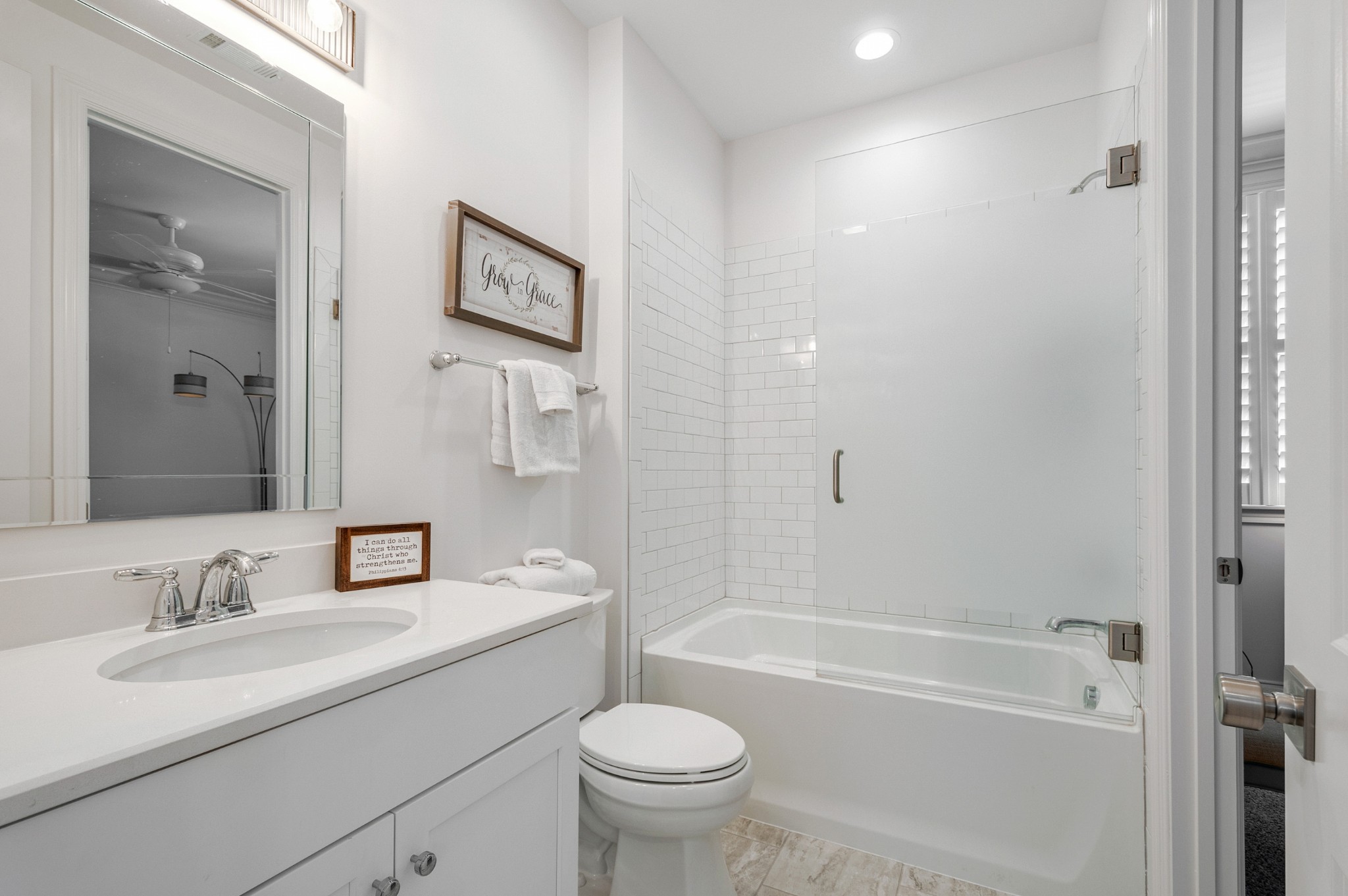 1043 Calico Street Franklin, TN 37064 - Photo 28 of 35 a bathroom with a sink toilet tub and shower