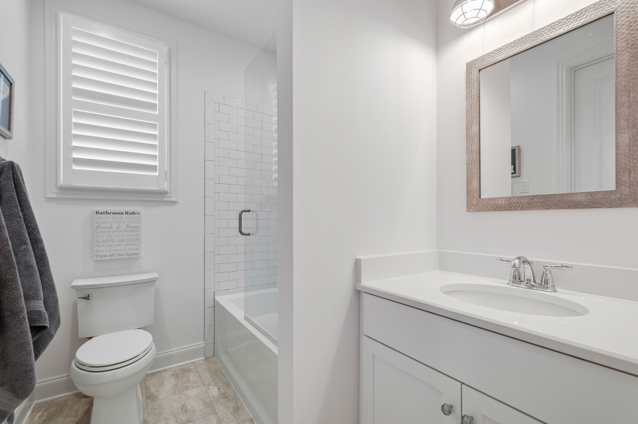 1043 Calico Street Franklin, TN 37064 - Photo 30 of 35 a bathroom with a sink toilet and vanity